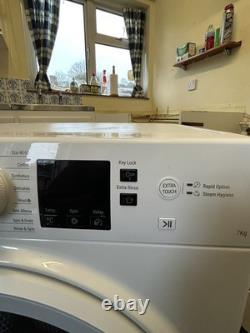 Hotpoint NSWE 743U Washing Machine White