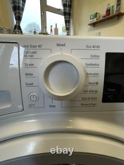 Hotpoint NSWE 743U Washing Machine White