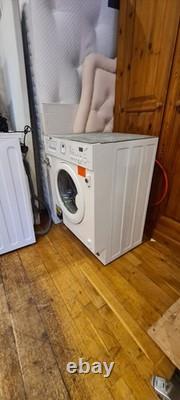 Lave-linge entièrement intégré Zanussi ZWI71201WA 7 kg avec programme de lavage rapide